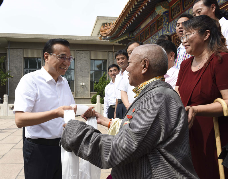為什么這位老師能受到李克強的高規(guī)格接見？